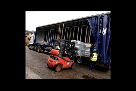 Stacked modules, shrinkwrapped for protection, are only delivered to site when they’re needed..